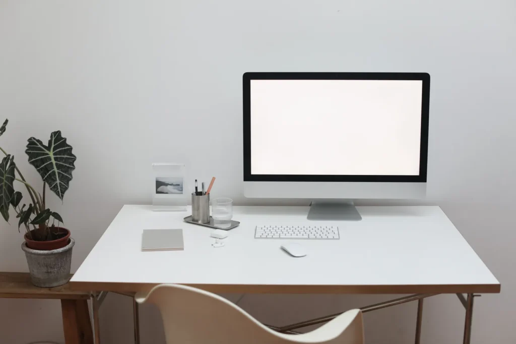 Simple uncluttered desktop in a small home office