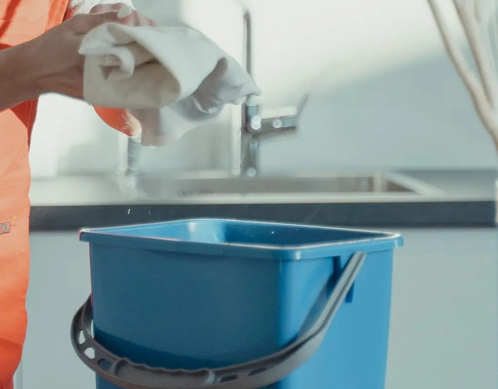 Collapsible cleaning bucket stored compactly in a small apartment