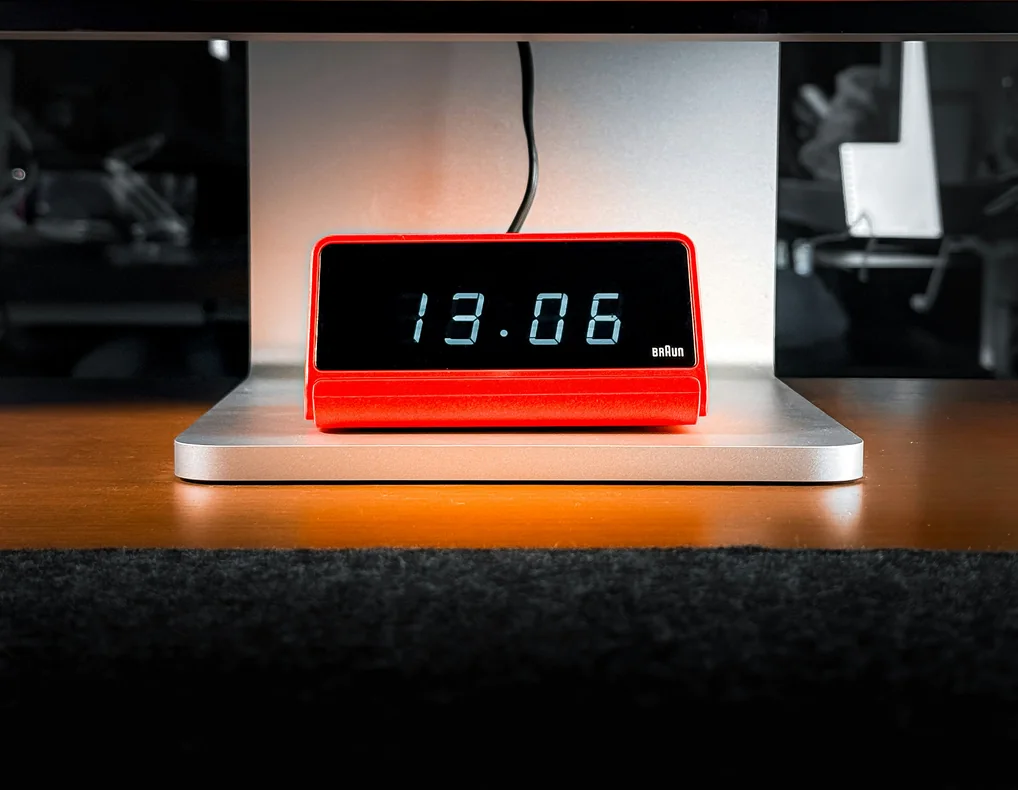 Compact desk clock with adjustable brightness for a small home office