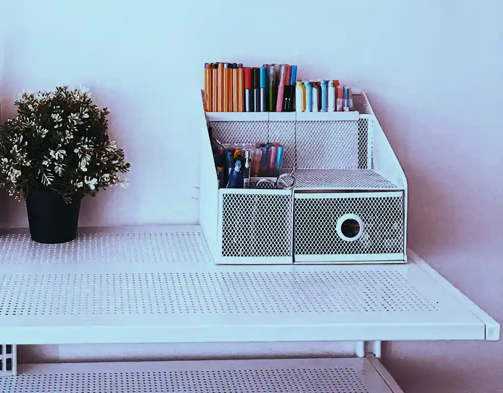 Compact desktop organizer with drawers for a small home office