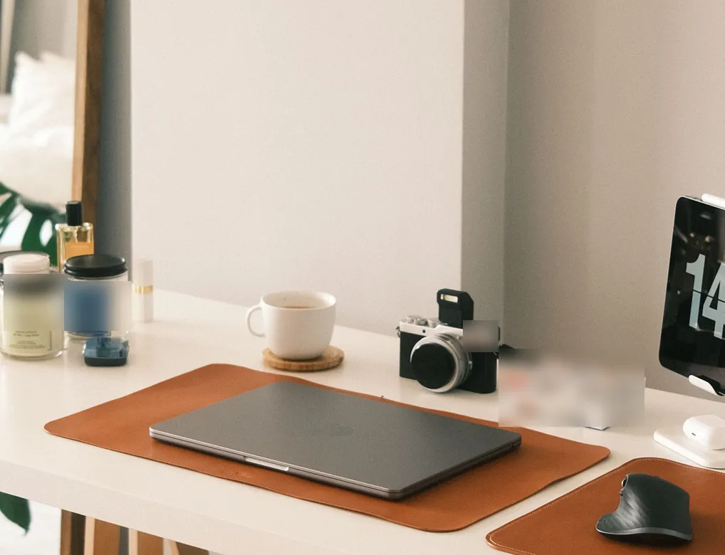 Minimal desk mat for a laptop-only small home office setup
