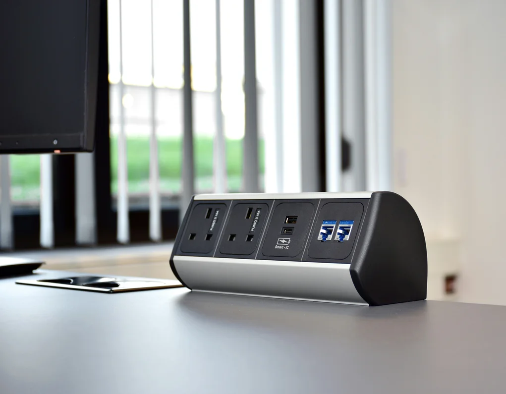 Compact power strip with accessible outlets