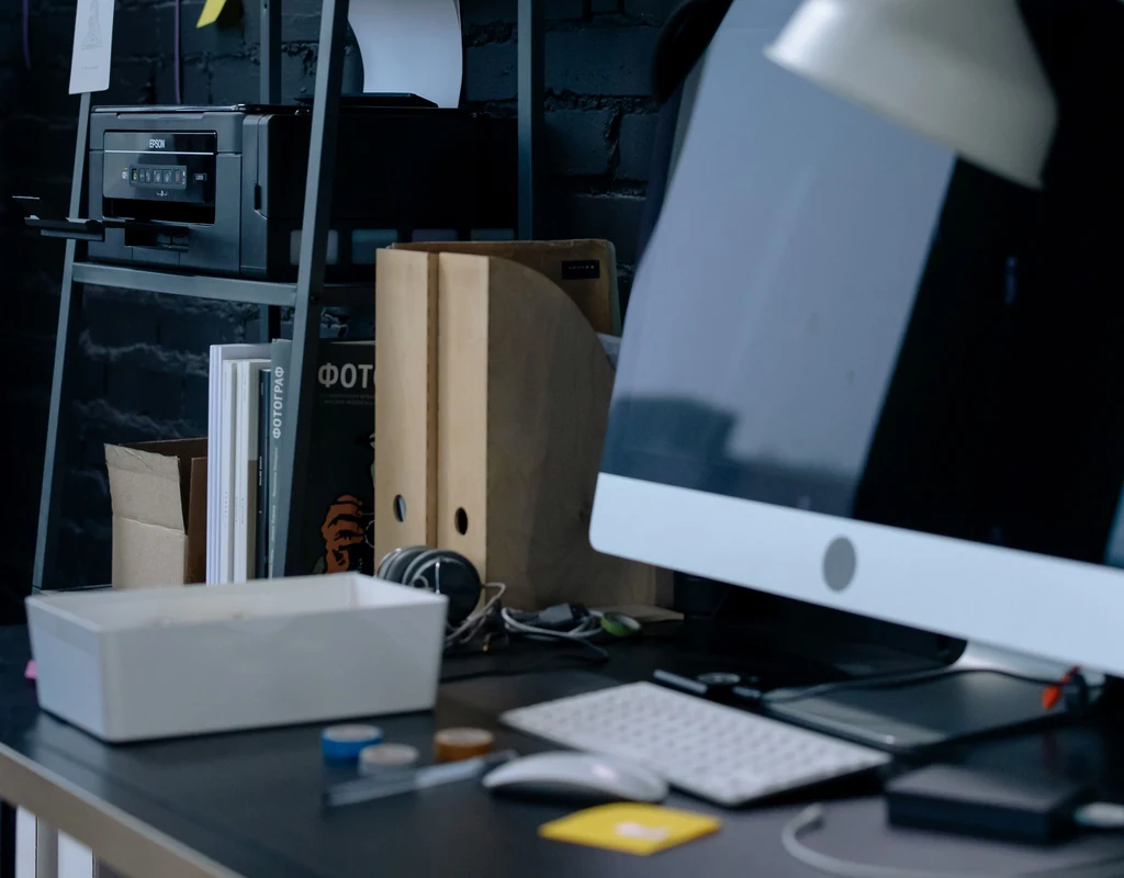 printer supplies stored near a small home office printer