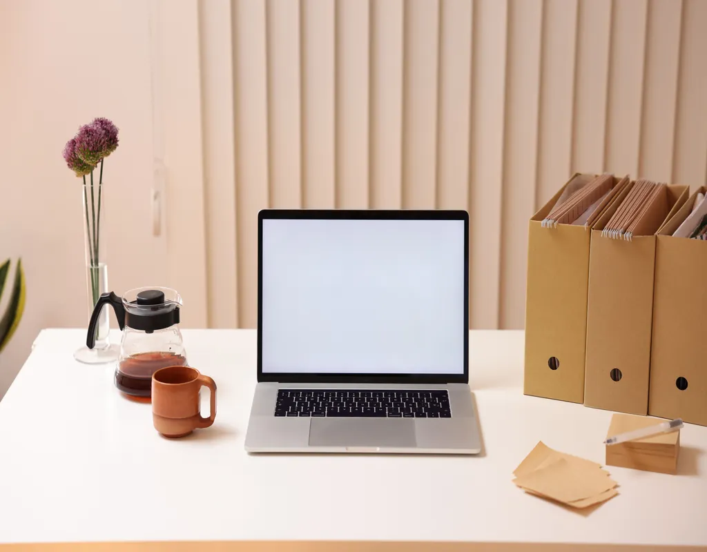 Small home office desk with an organized and clutter-free workspace